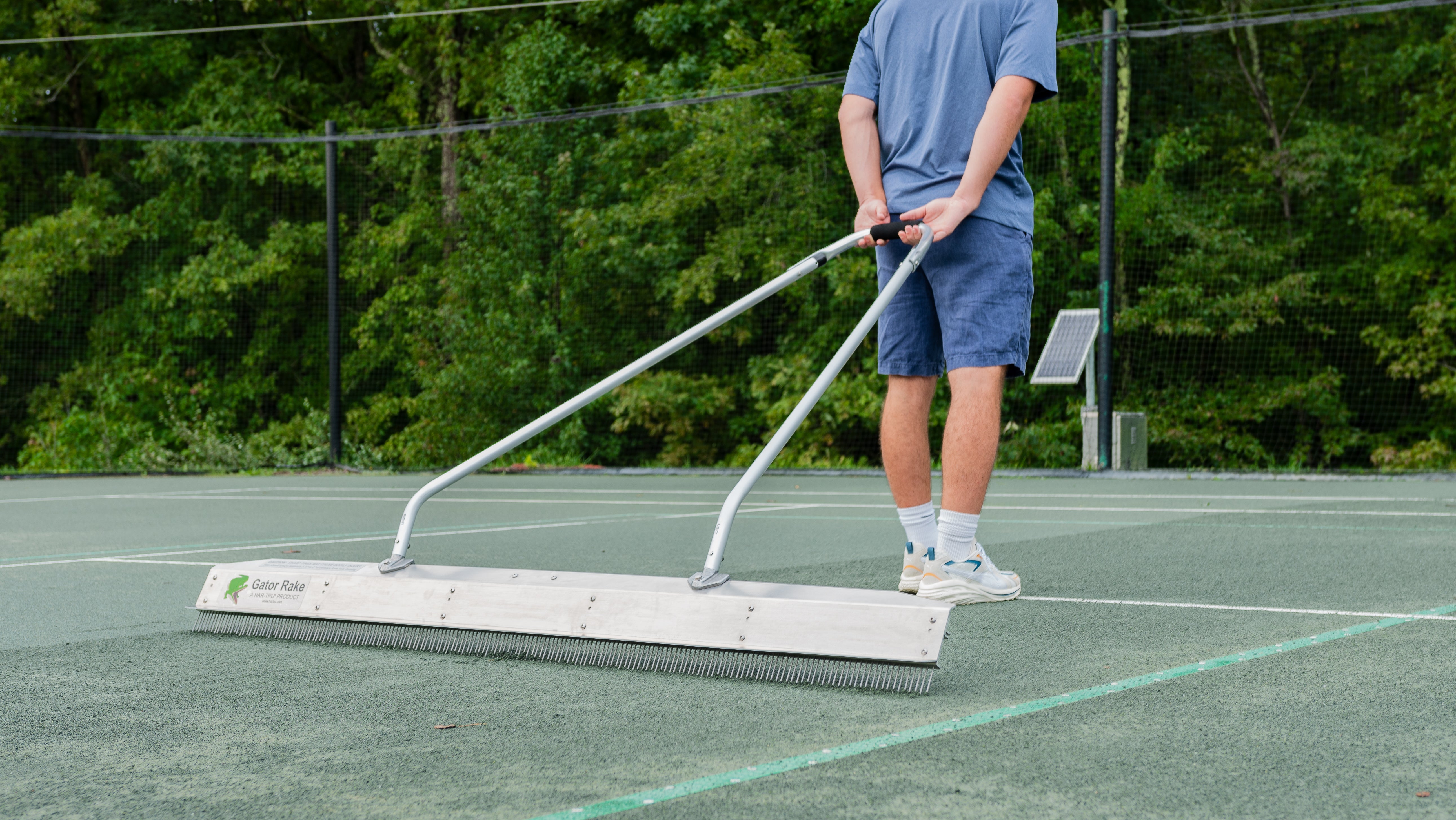 72" Hand Model Gator Rake in use on tennis court