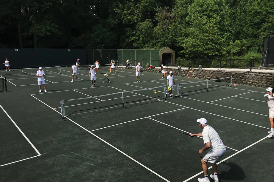 players in clay pickleball court in baltimore