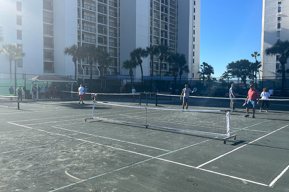 players in pickleball courts located in florida on a bright sunny day