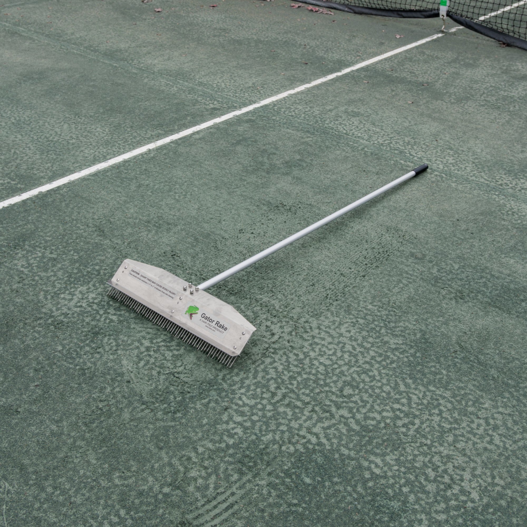 The Agitator 24" Hand Model Gator Rake for refreshing tennis courts lifestyle 2