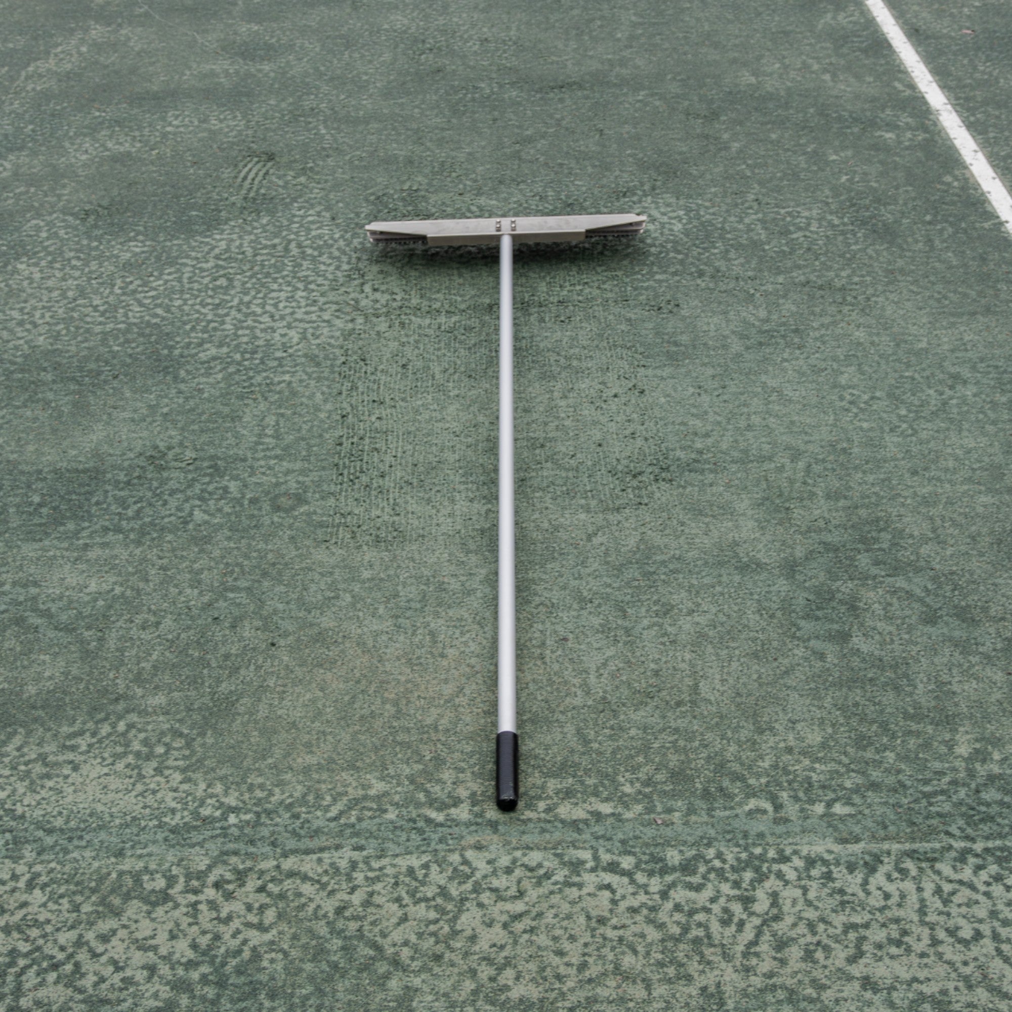 The Agitator 24" Hand Model Gator Rake for refreshing tennis courts lifestyle 3