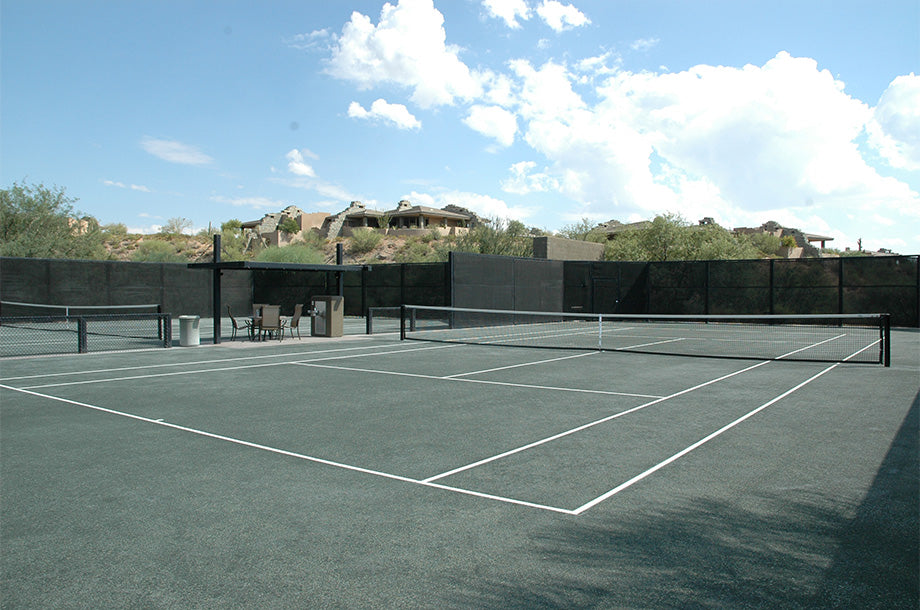 green clay tennis court in desert mountain