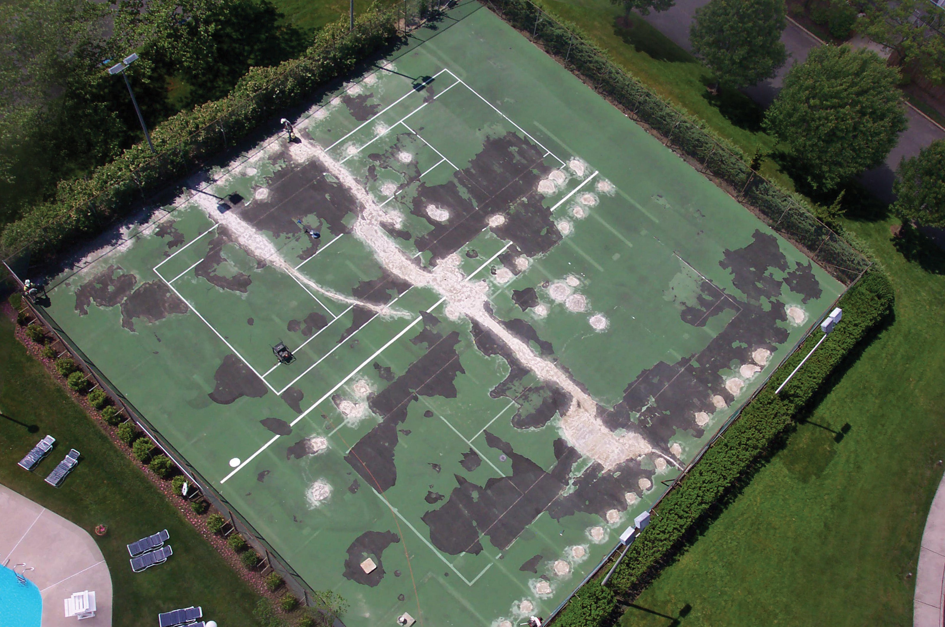 before image of tennis court without hard armor